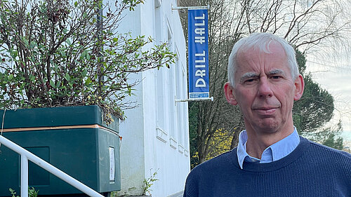 John Milne outside the Drill Hall